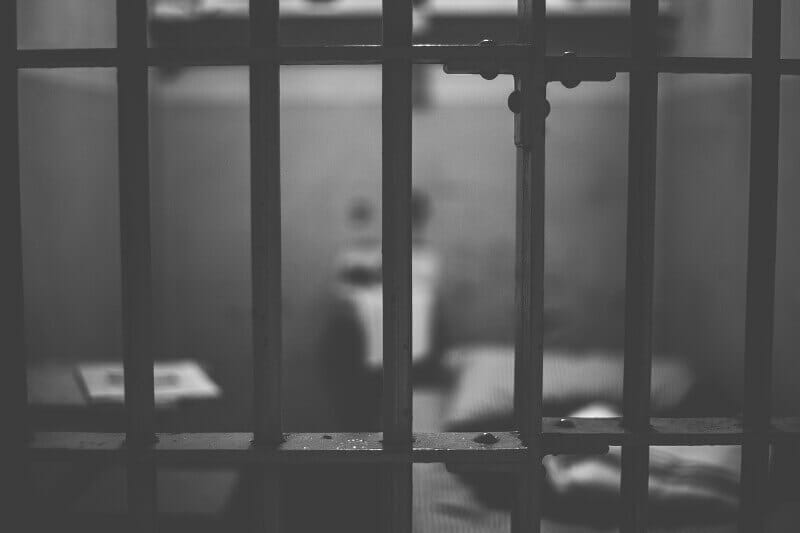 prison cell in black and white